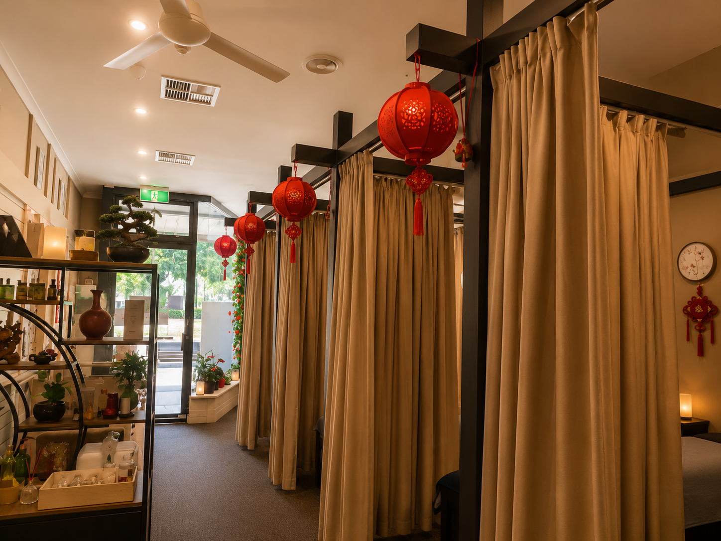 Spa interior with traditional red Chinese lanterns and treatment booths